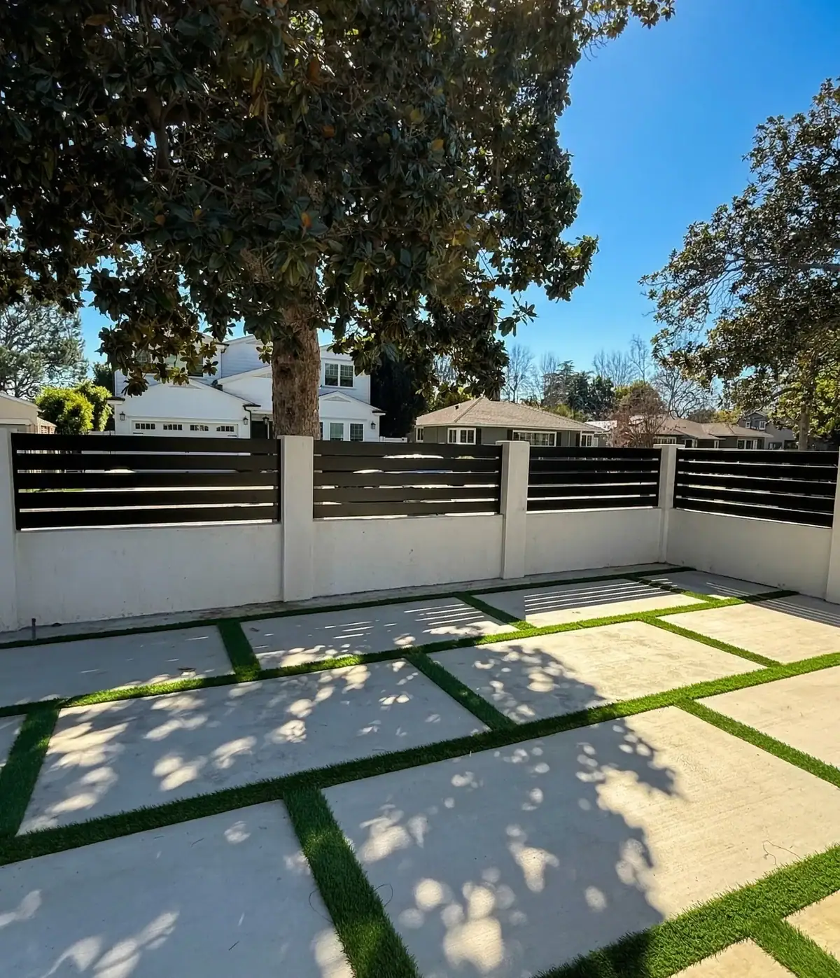 Black aluminum wall topper installation in Sherman Oaks, California