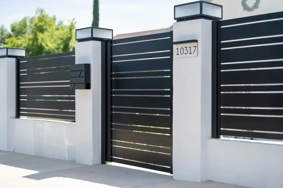 Black aluminum wall topper installation in Sherman Oaks