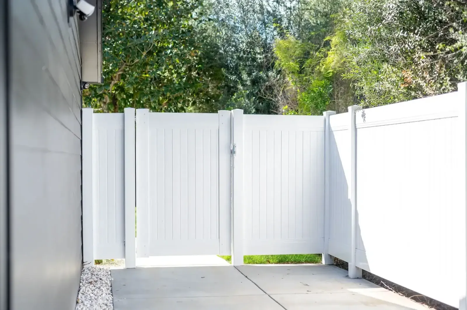 White vinyl picket fence installation